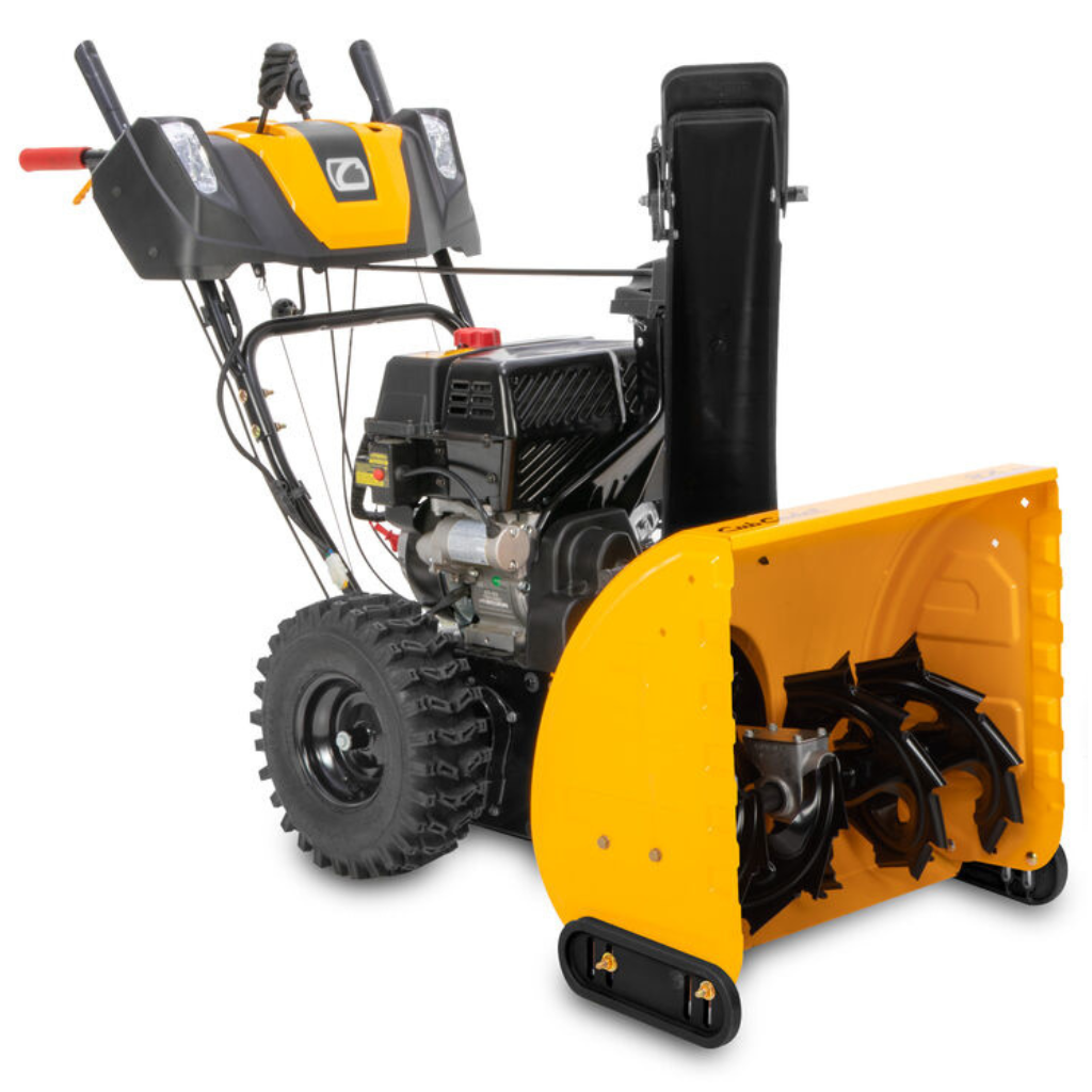 The CUB CADET SNOW BLOWER 2STG:24 is a yellow and black two-stage gas snow blower featuring large wheels, a discharge chute, and visible engine and auger components.