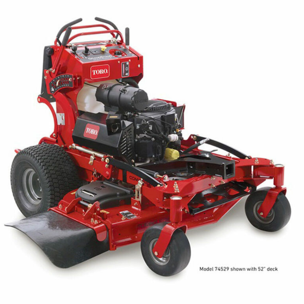 Red TORO GrandStand MultiForce with a 52" deck, 26.5 HP Kohler EFI engine, commercial walk-behind mower featuring large rear tires and control panel.